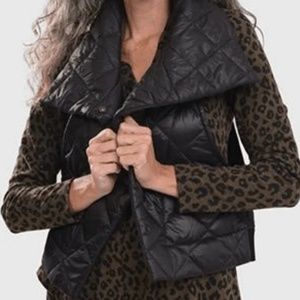 Lightweight, fashion-forward, sleek flat quilted vest, perfect for all seasons